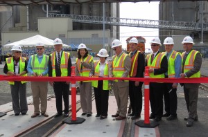 Left to right: Shari Hildreth, Office of U.S. Rep. Herrera Beutler; David Hodges, Office of U.S. Sen. Murray;	Port Commissioner Jerry Oliver; U.S. Sen. Cantwell; Port Commission President Nancy Baker; Port Commissioner Brian Wolfe; Port CEO Todd Coleman; Johan Hellman, BNSF Railway; WSDOT Southwest Regional Administrator Kris Strickler; Great Western Malting Commercial Director Brad Loucks